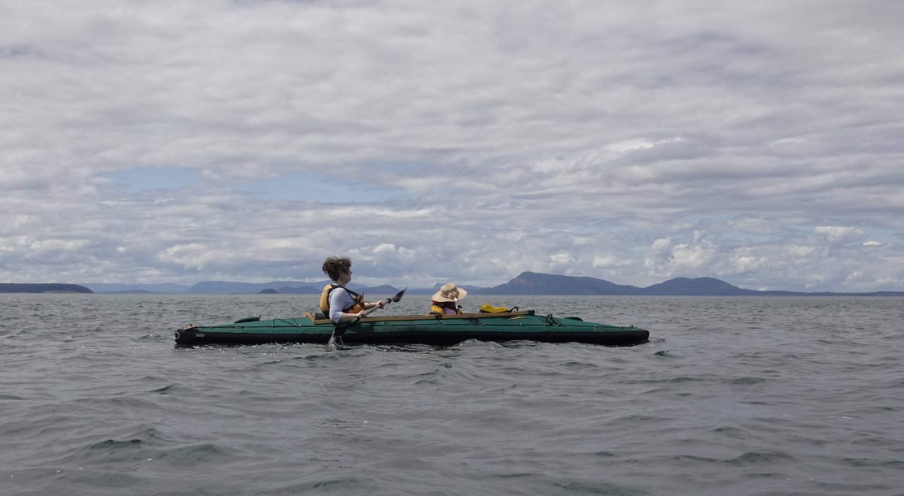 03 Maya and Rachel kayaking to Sucia Island.JPG